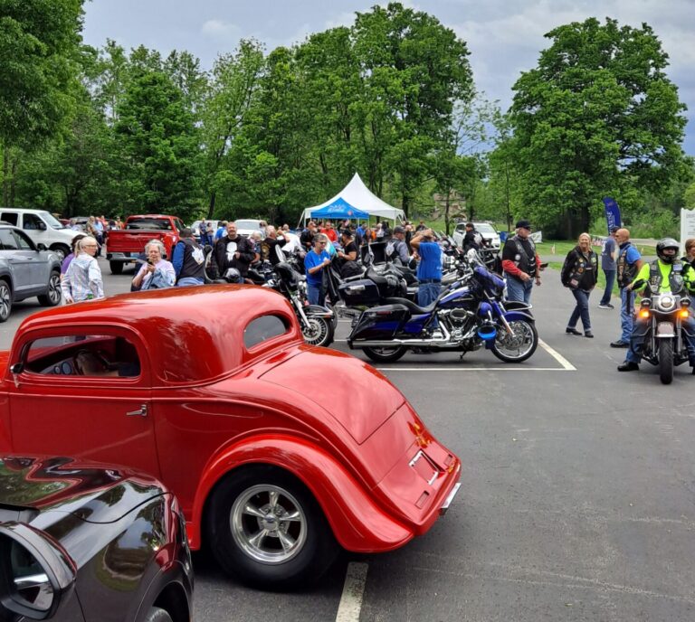 Classic car and motorcycles gathered at the Ride to the Ranch event